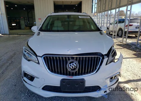 2018 Buick Envision Essence z USA, uszkodzony, nr VIN LRBFX2SA9JD000854